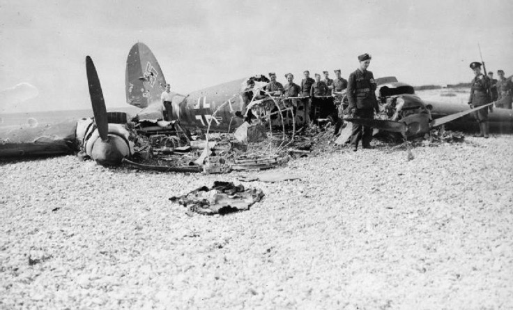 1 RAF personnel examine the wreck of Heinkel He 111H G1+LK